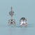 The checkerboard round earrings add a unique touch.