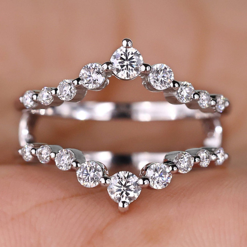 Round diamond wedding band with classic design.
