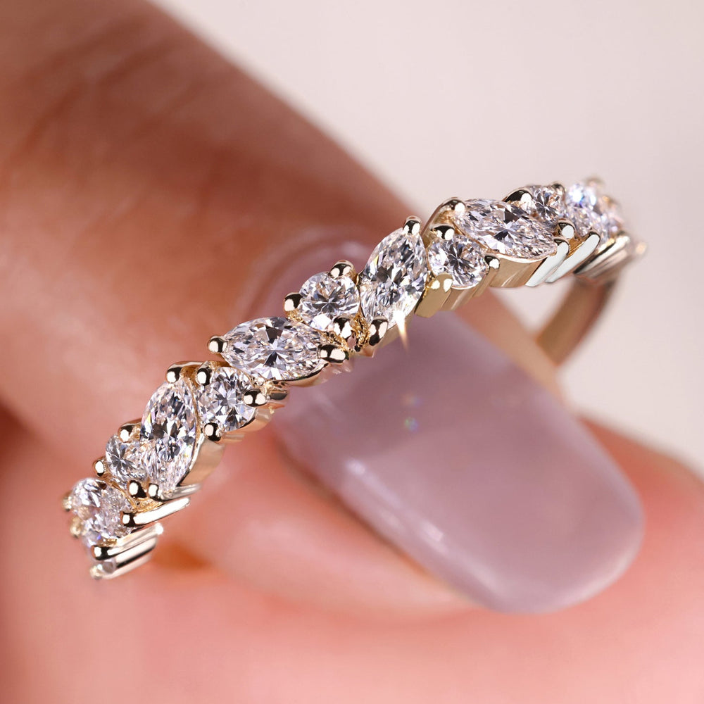 Marquise wedding band featuring a stunning marquise diamond wedding band design.
