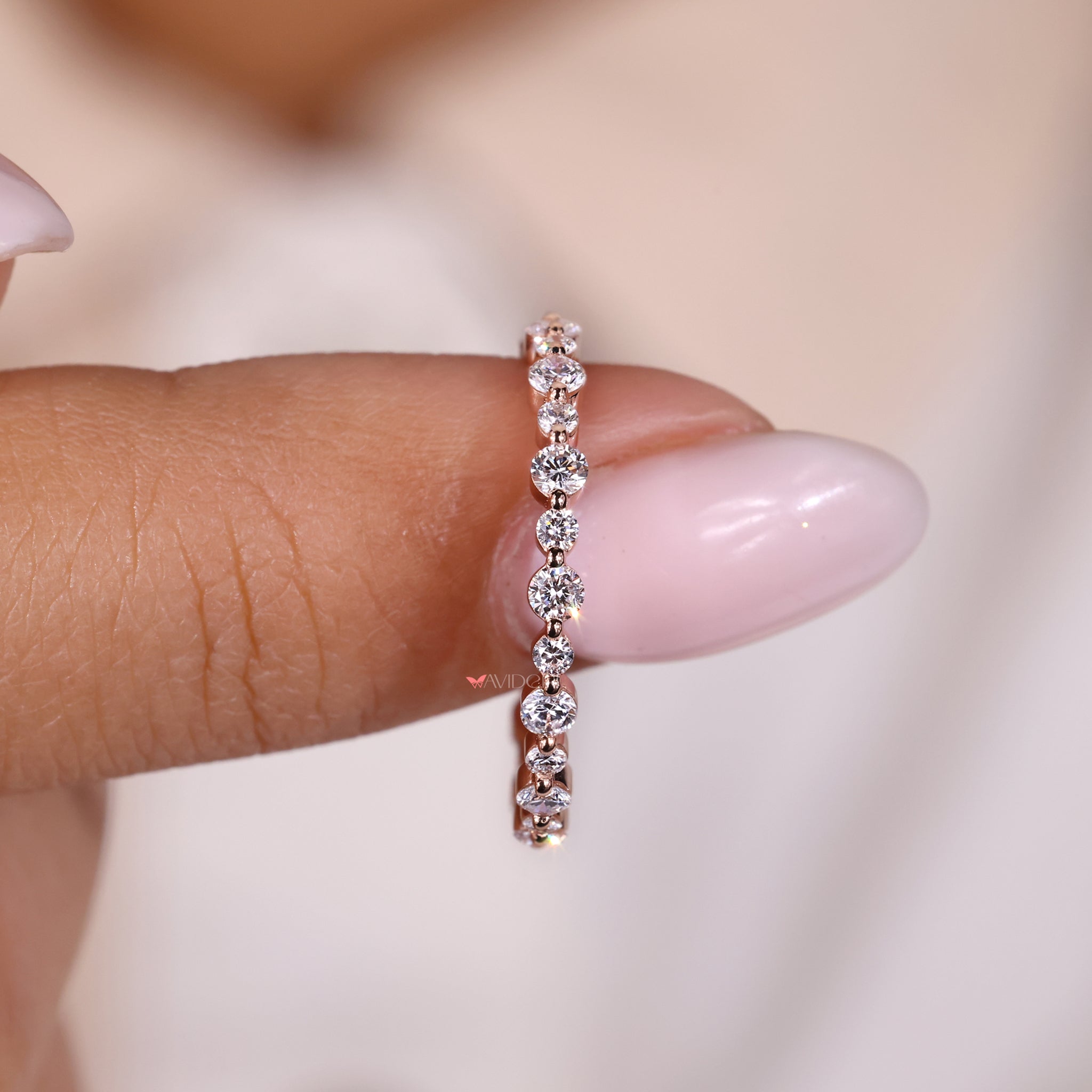 Shared prong band setting with round diamond eternity band for secure brilliance.

