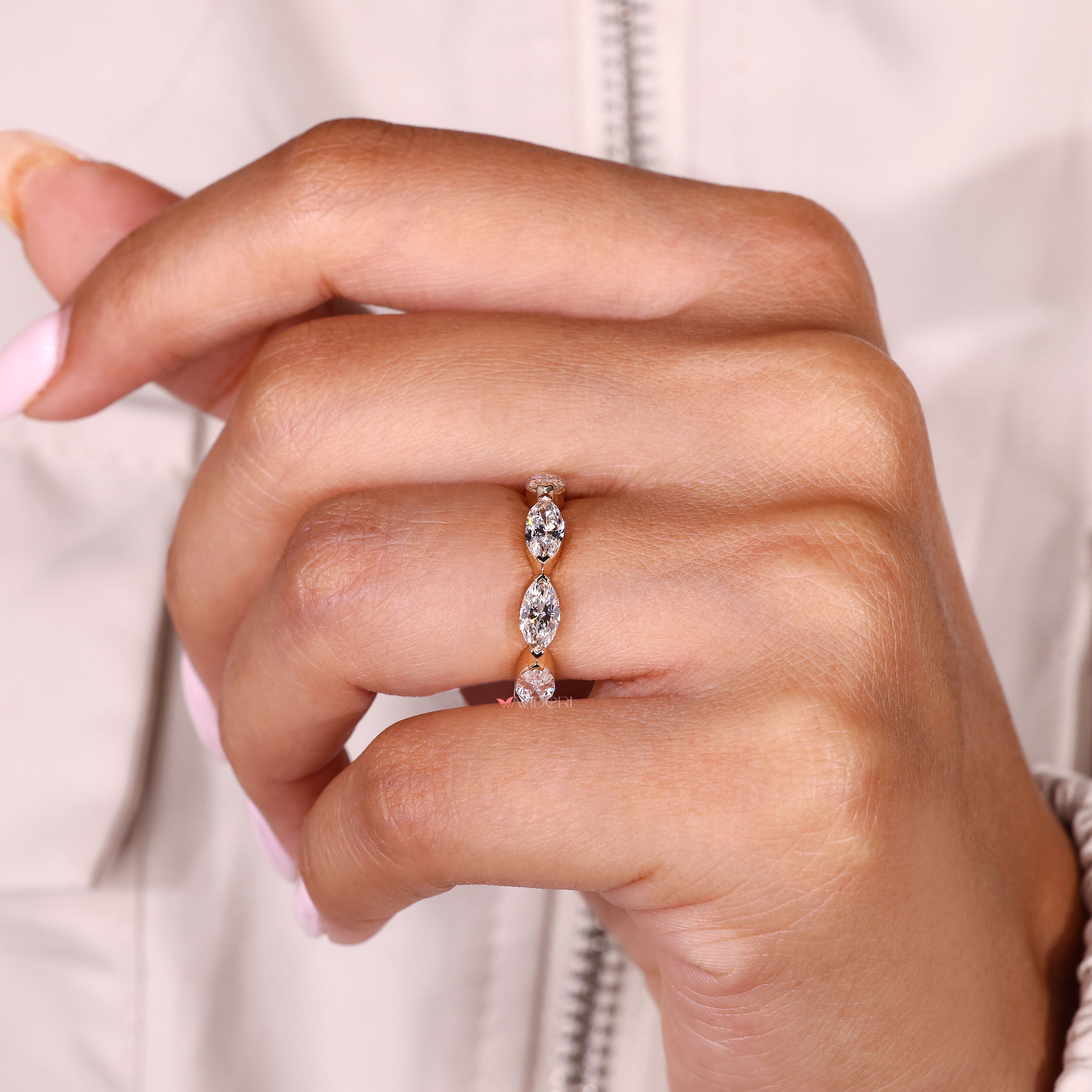Avideri marquise wedding band with V prong design details
