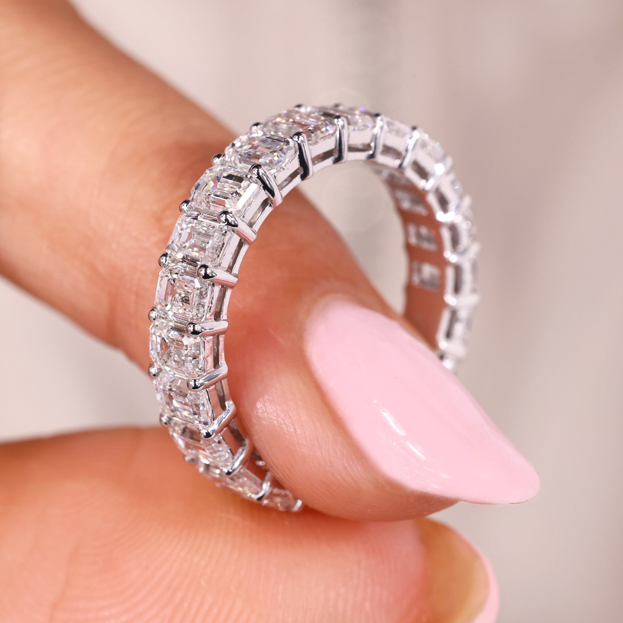 Full eternity band with shared prong wedding band.