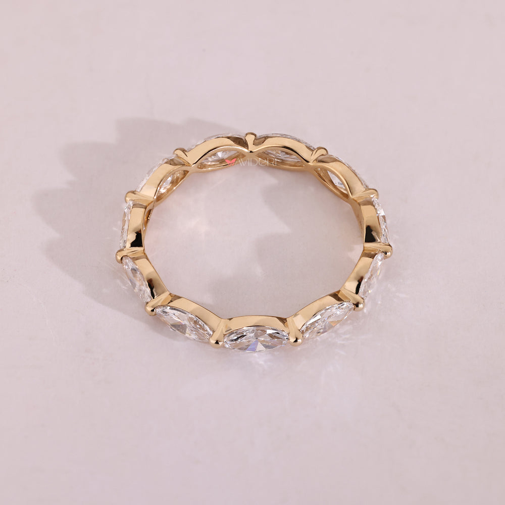 Yellow gold marquise diamond wedding band for her.