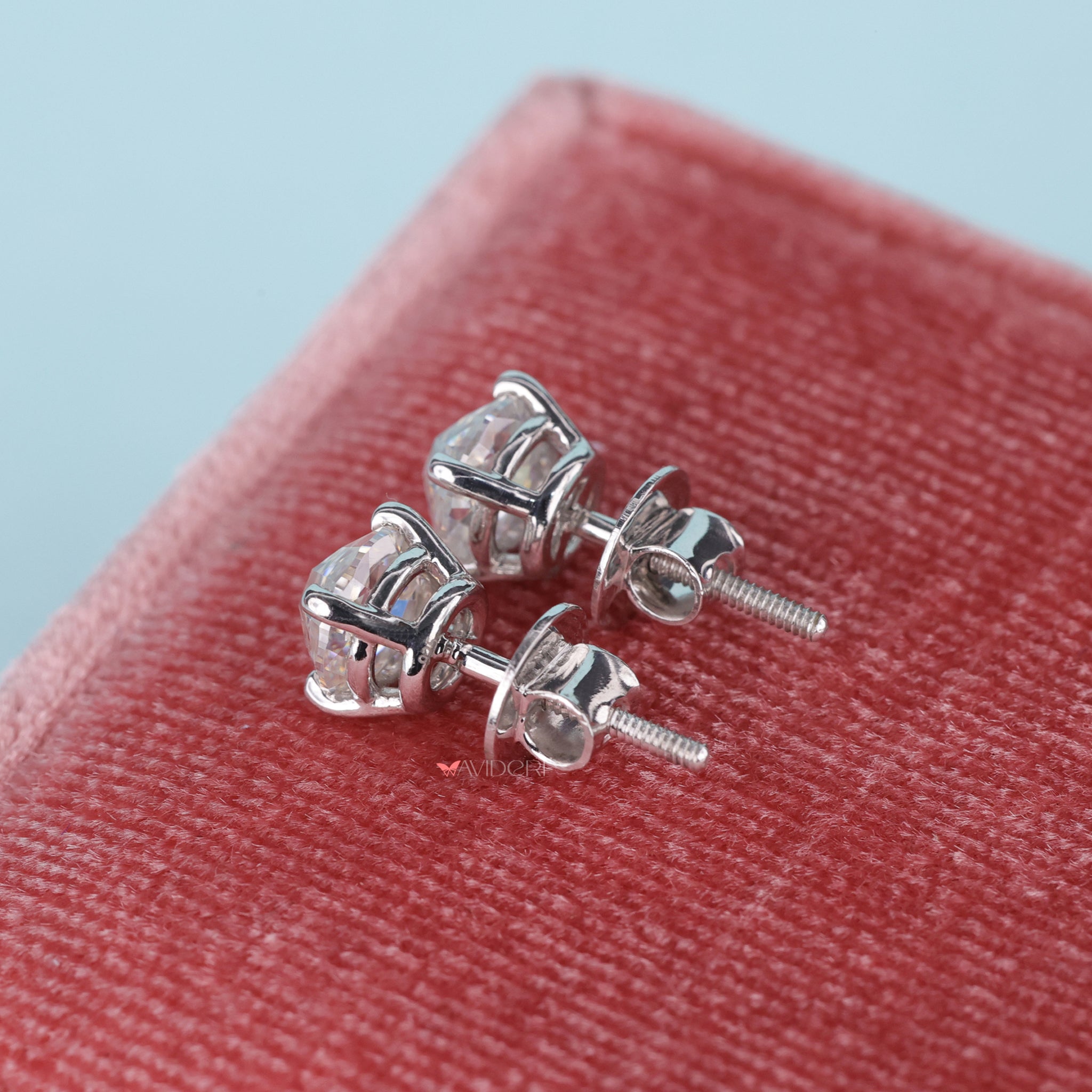 These white gold stud earrings have a sleek, polished look.