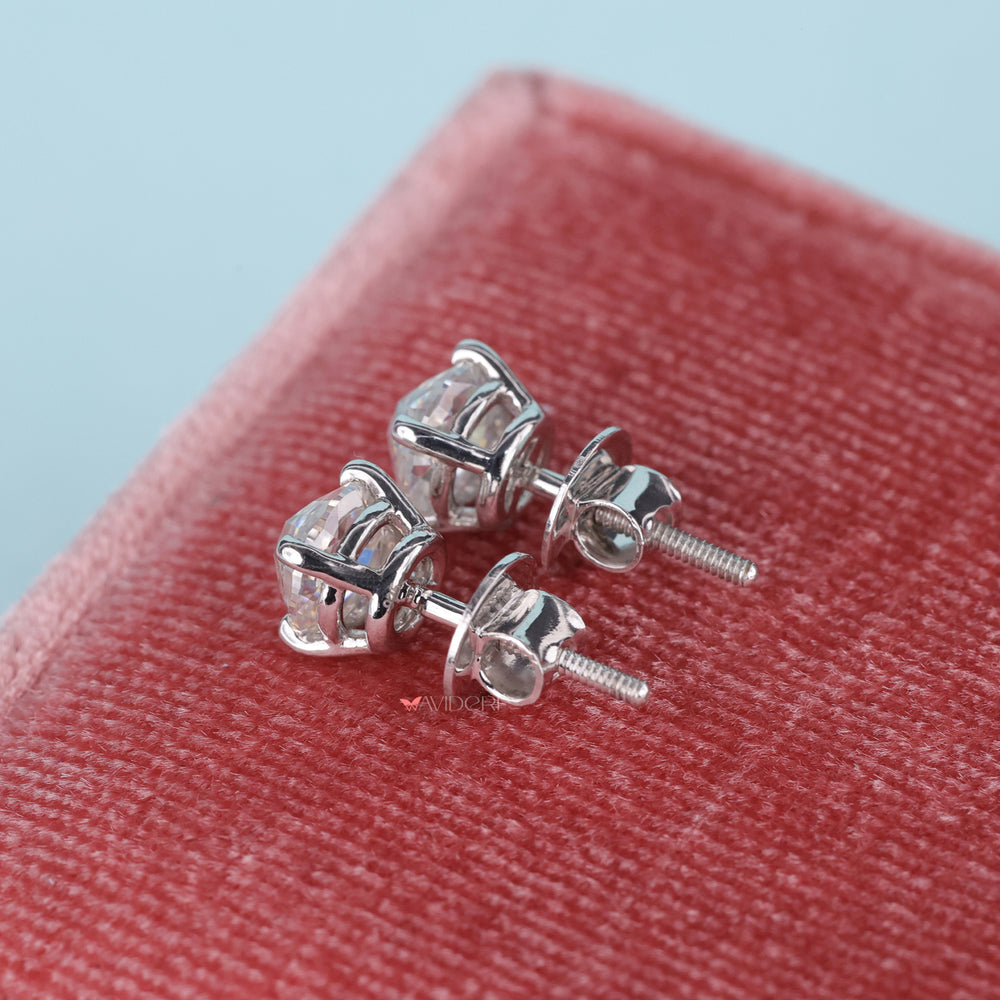 These white gold stud earrings have a sleek, polished look.