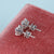 These white gold stud earrings have a sleek, polished look.