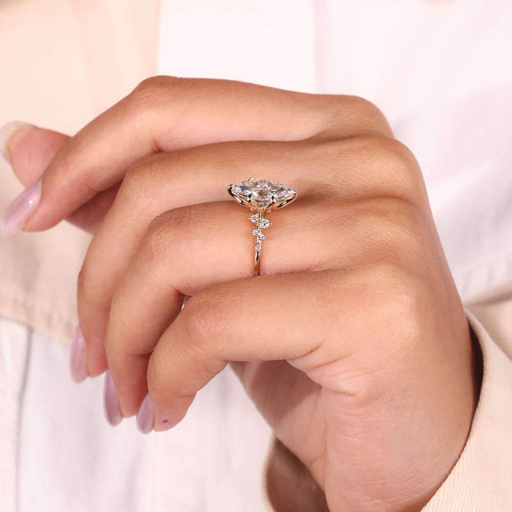 Yellow gold engagement ring with a round diamond center, designed for a clean and classic appearance.
