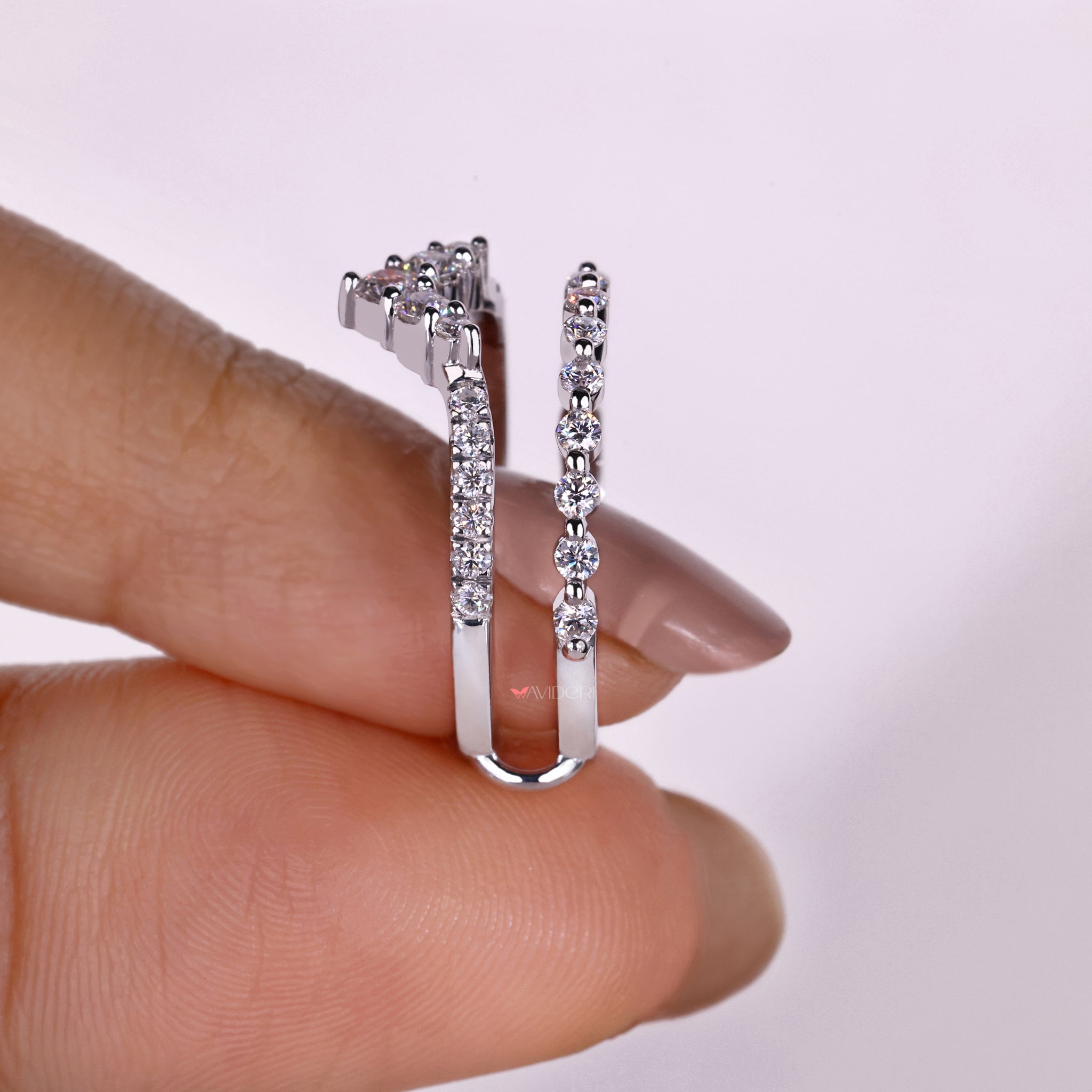 Prong set wedding band crafted for secure brilliance.
