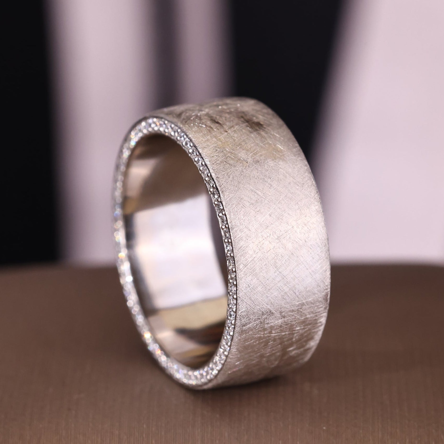 Men’s diamond wedding ring with double side pave.