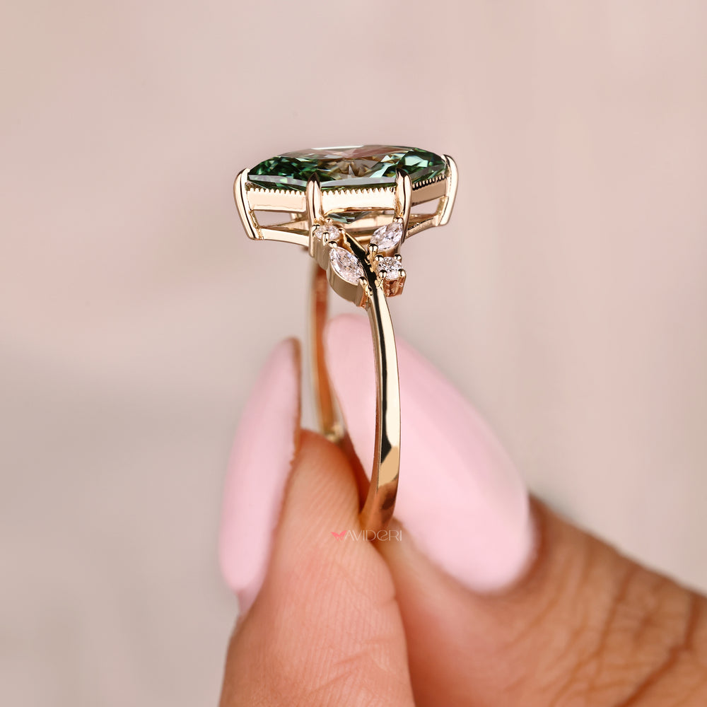 Handmade marquise diamond ring with round side stone accents
