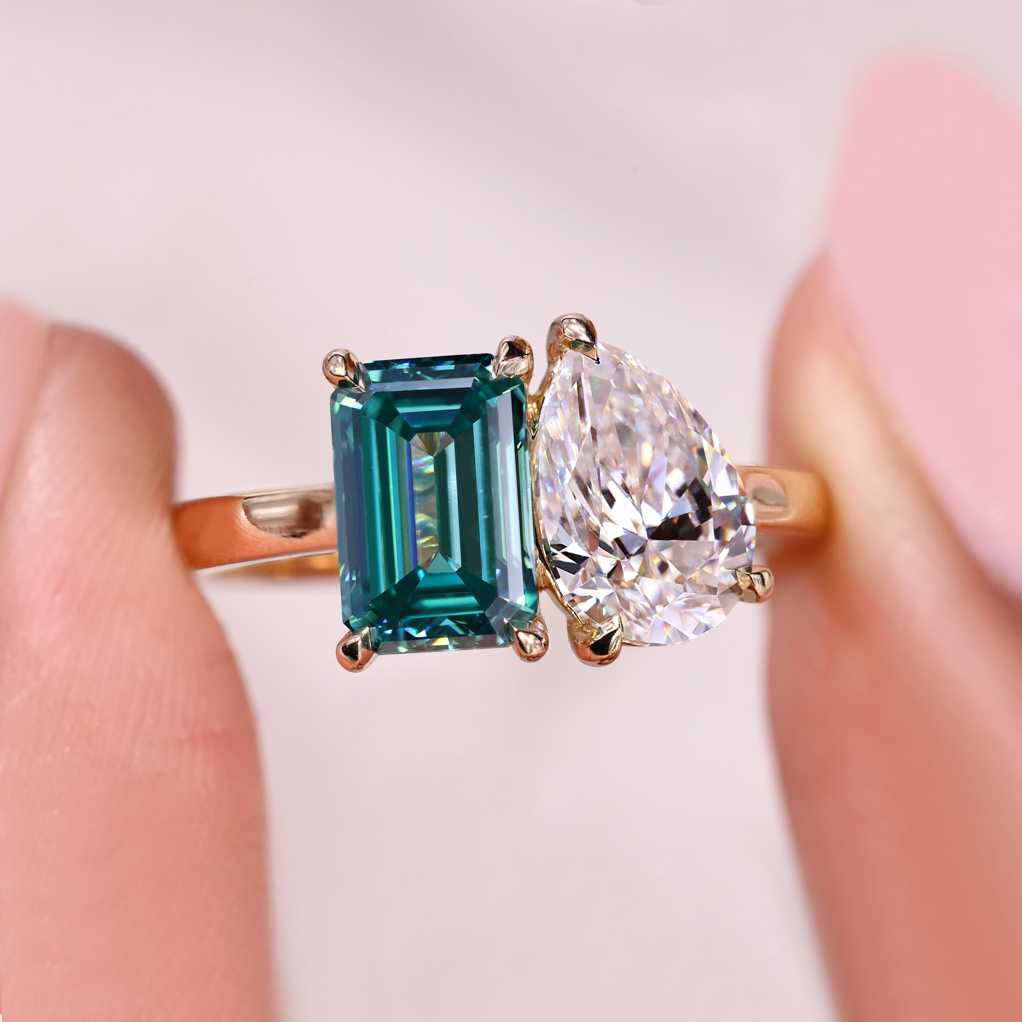 Avideri engagement ring with two stone pear and emerald cut.