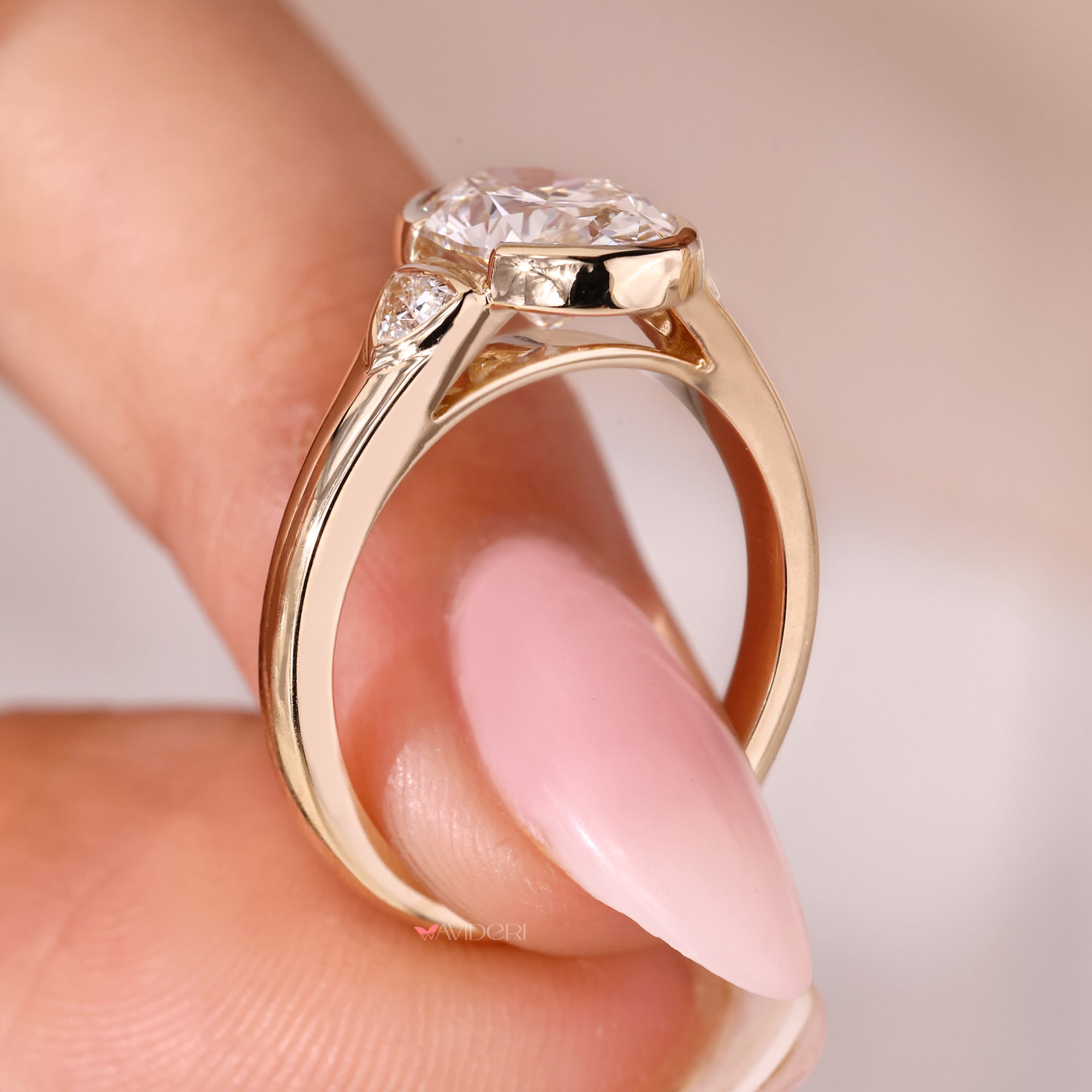 Cathedral setting ring with yellow gold engagement ring.