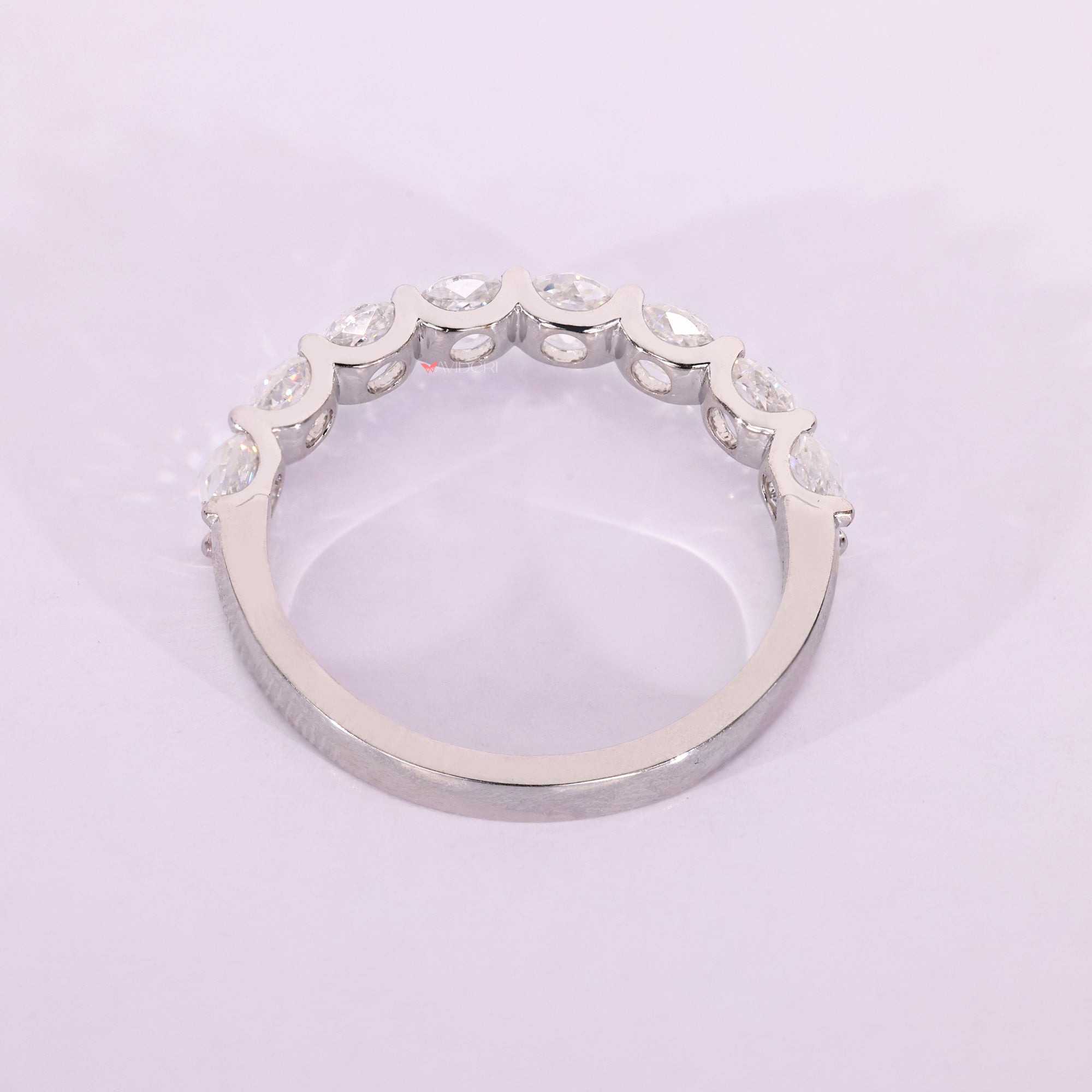 White gold wedding band delivers sleek elegance with a polished, bright finish.