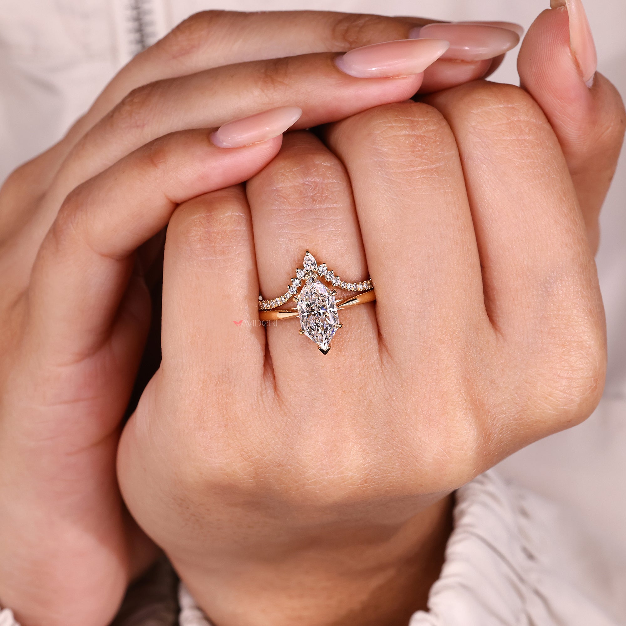 Dutch marquise solitaire ring with matching band.
