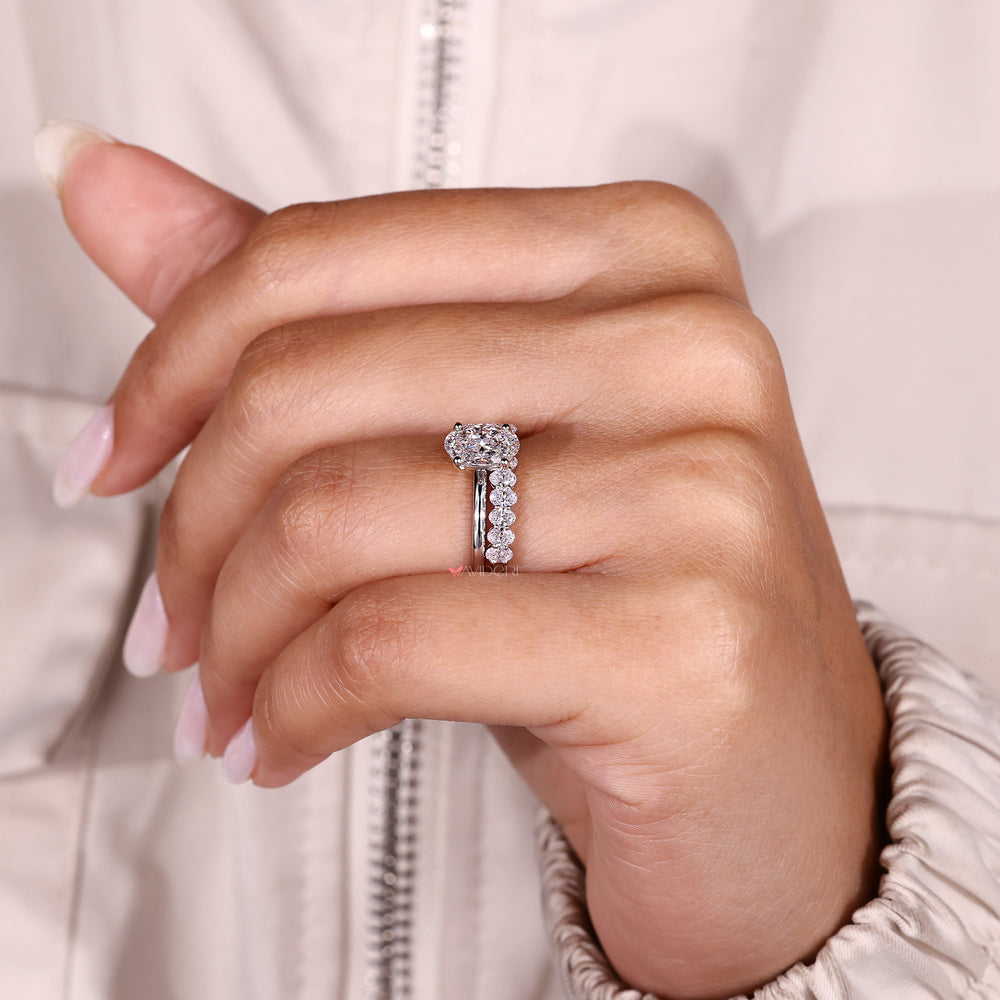 Handmade oval cut diamond ring and band set.
