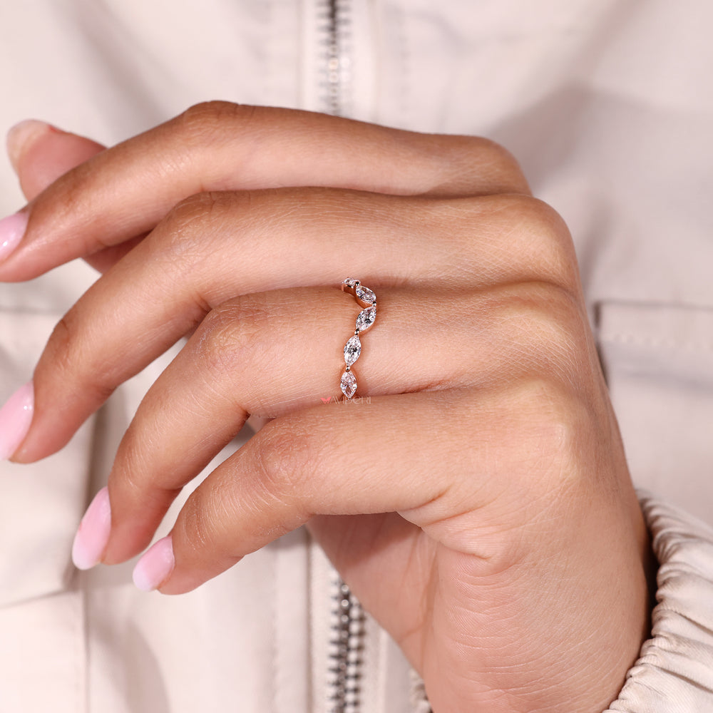 Shared prong diamond half eternity band.
