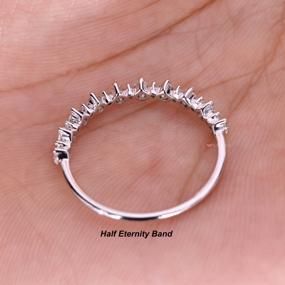 Classic white gold half eternity band with diamonds encircling the entire band.
