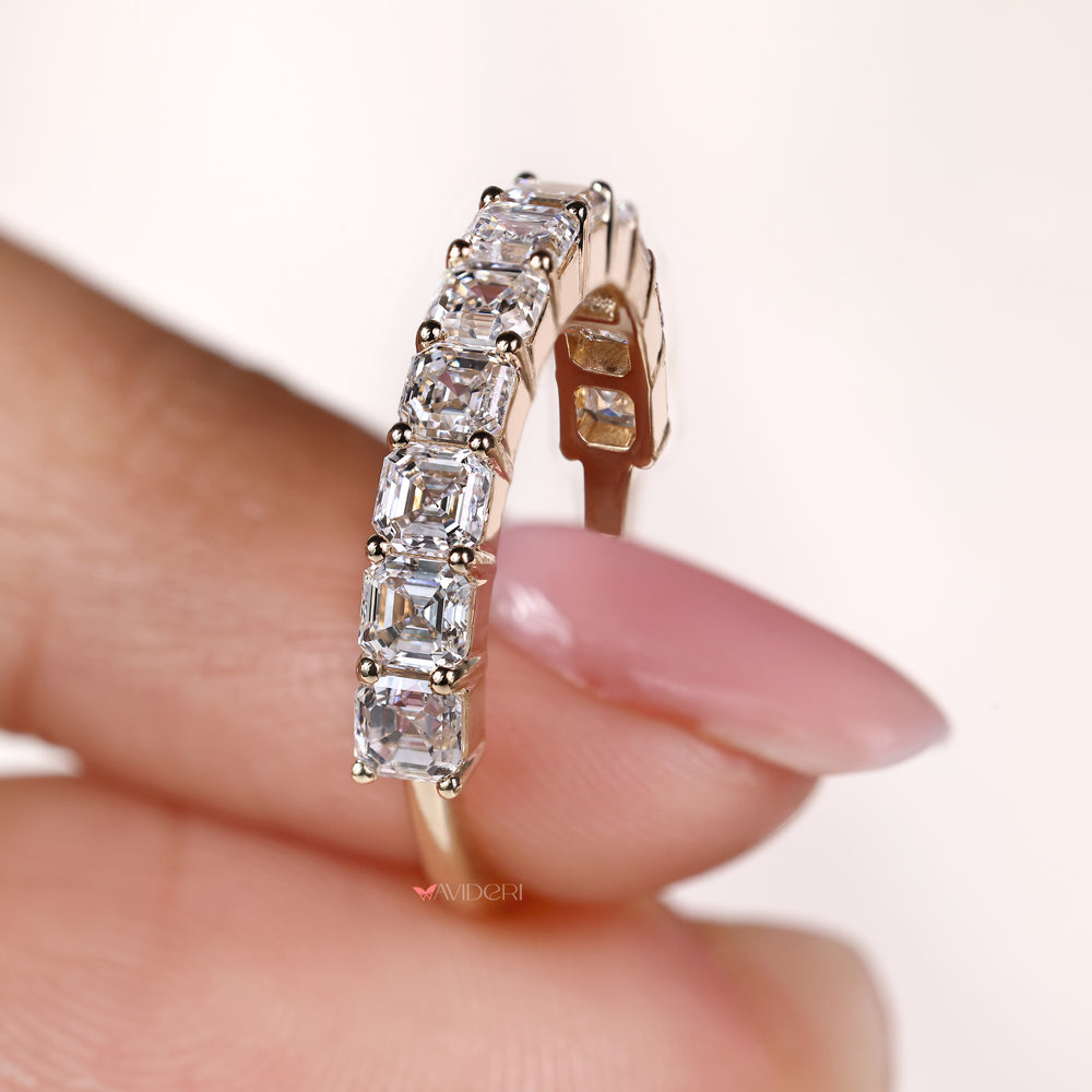 Semi eternity band featuring asscher diamonds in prong setting
