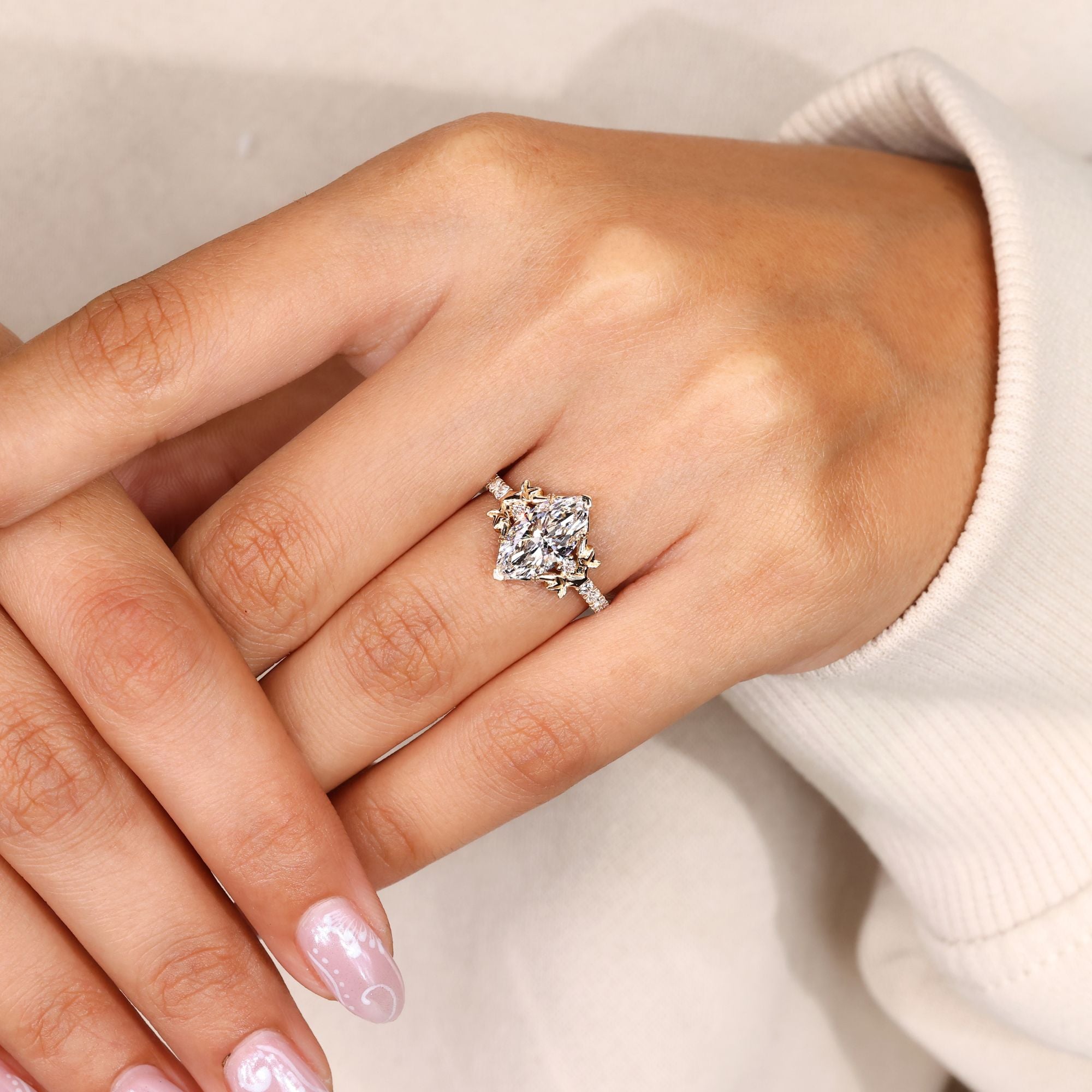 Marquise engagement ring with nature inspired style.
