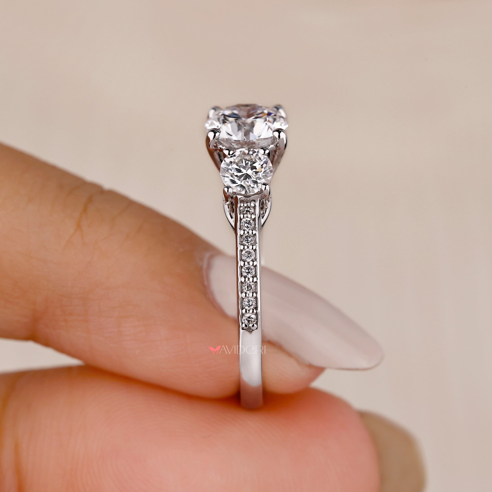 Pave ring with round cut diamond.
