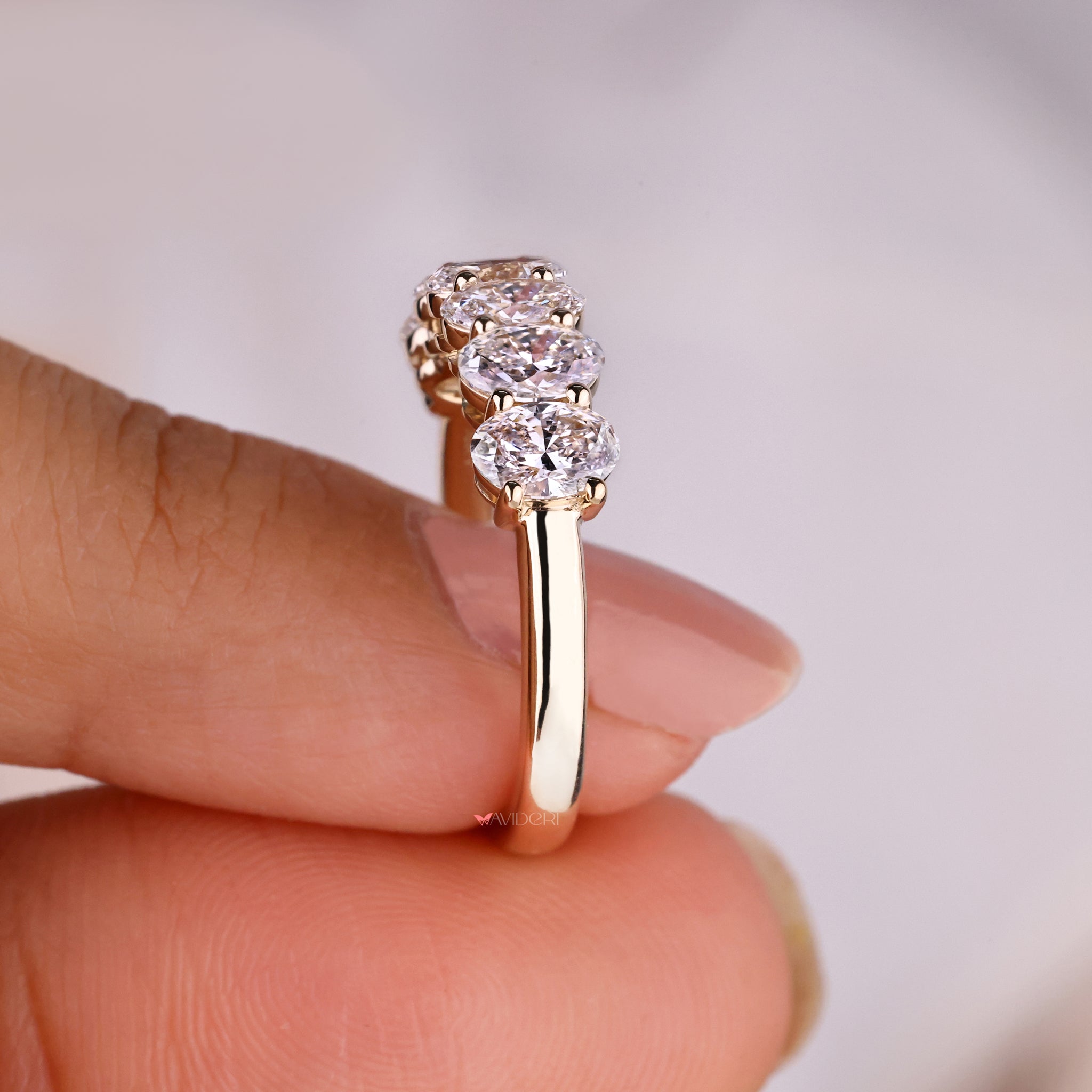 Prong set wedding band with secure sparkle.
