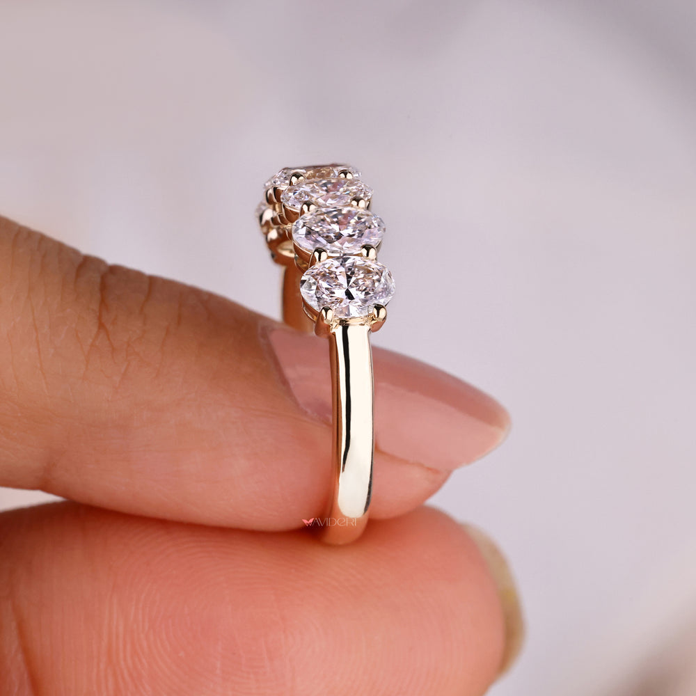 Prong set wedding band with secure sparkle.
