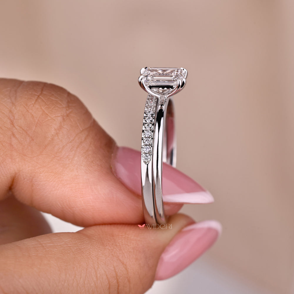 Solitaire emerald cut ring blending simplicity with sophistication
