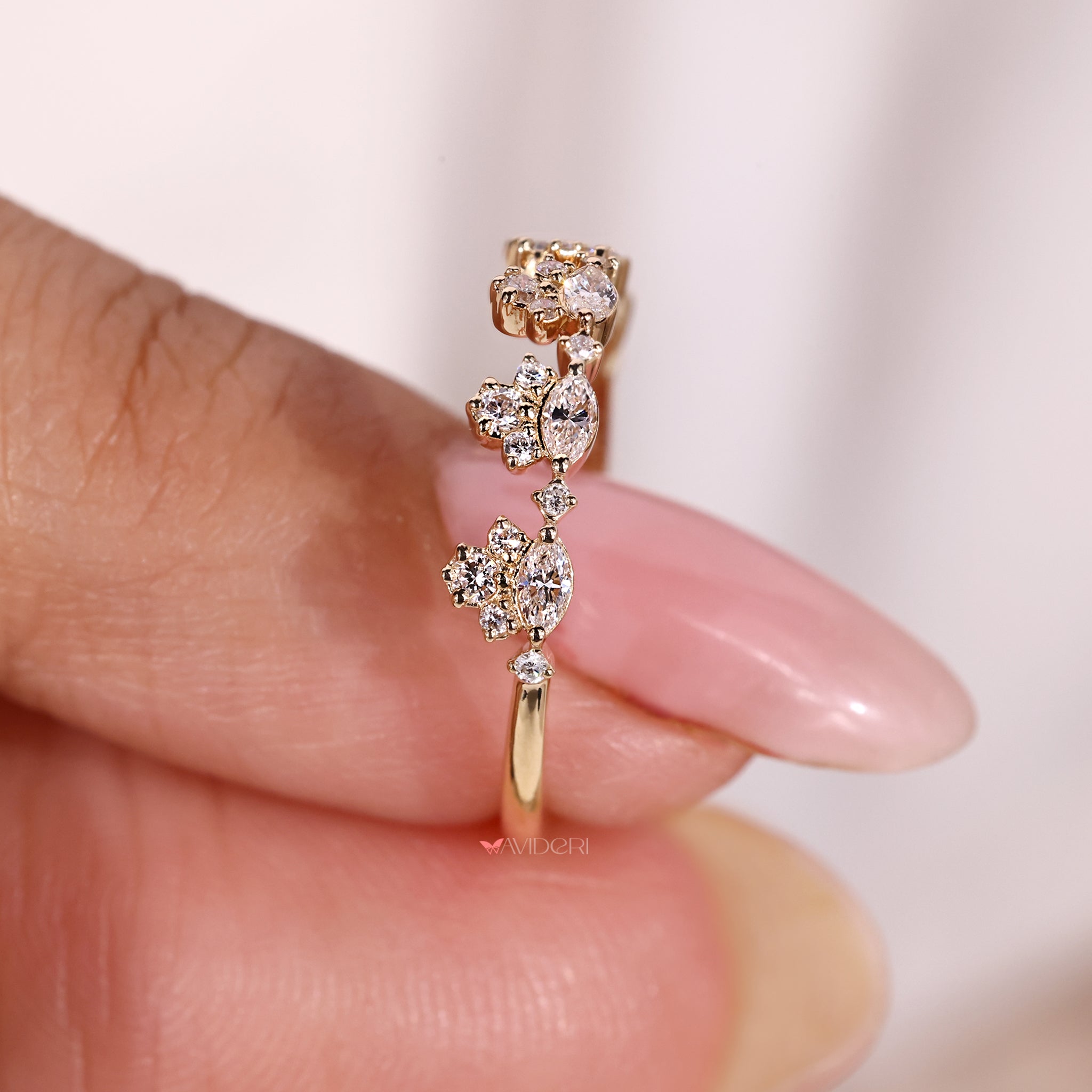 Marquise and round diamond wedding band designed with lab grown stones.
