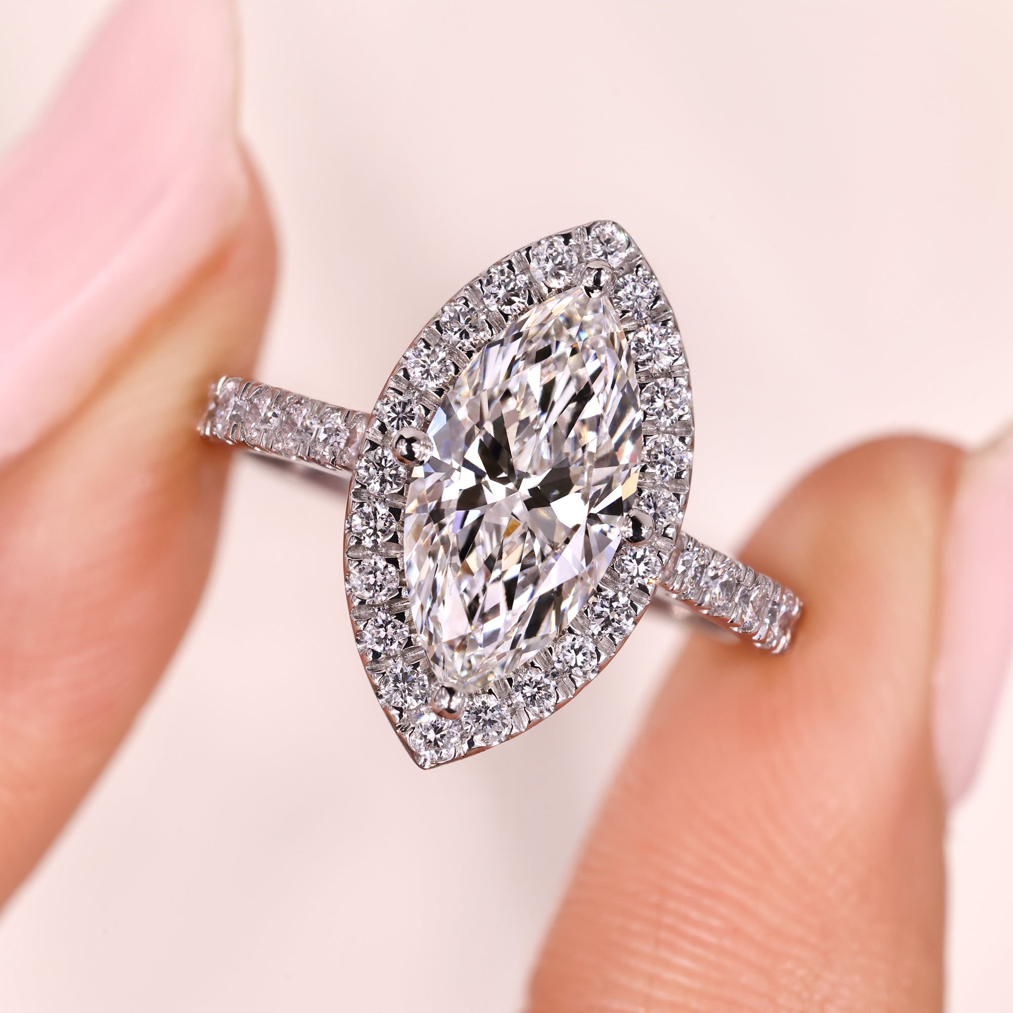 Buy an engagement ring with compass prong setting.