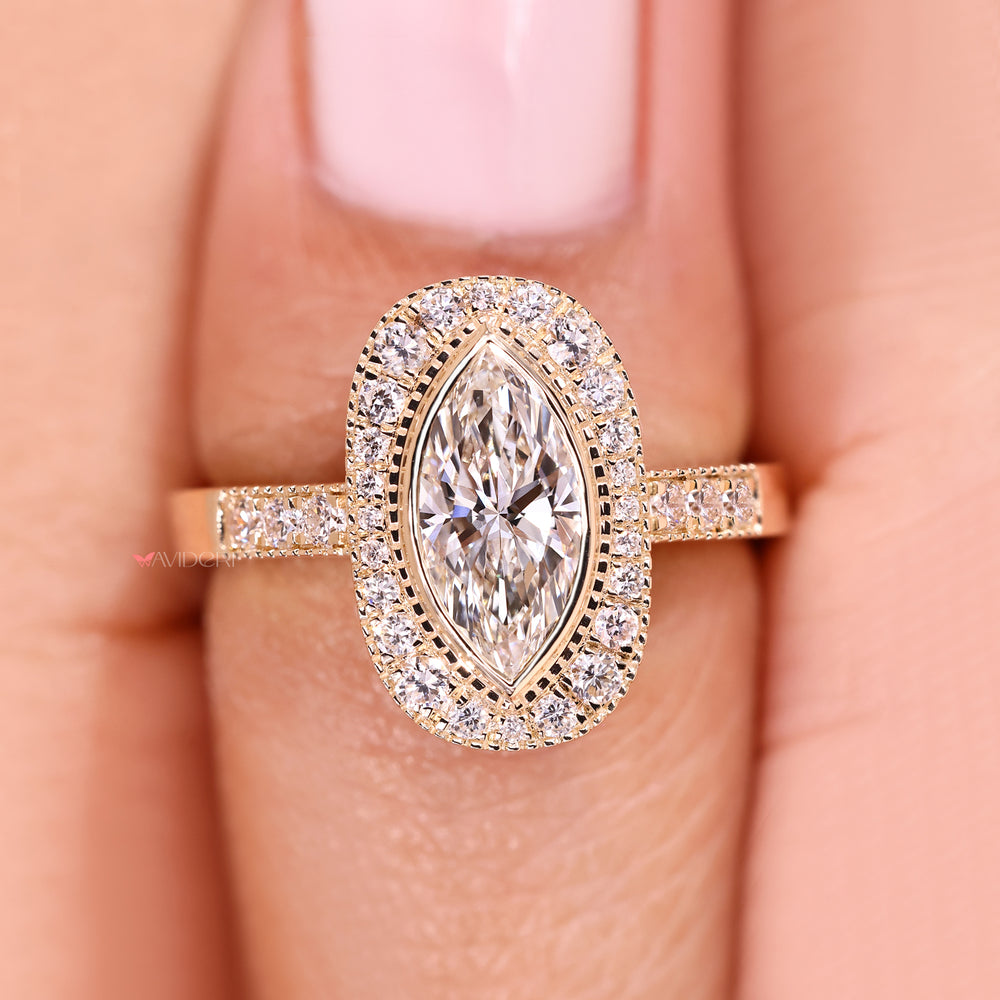 Lab grown marquise diamond ring with milgrain.
