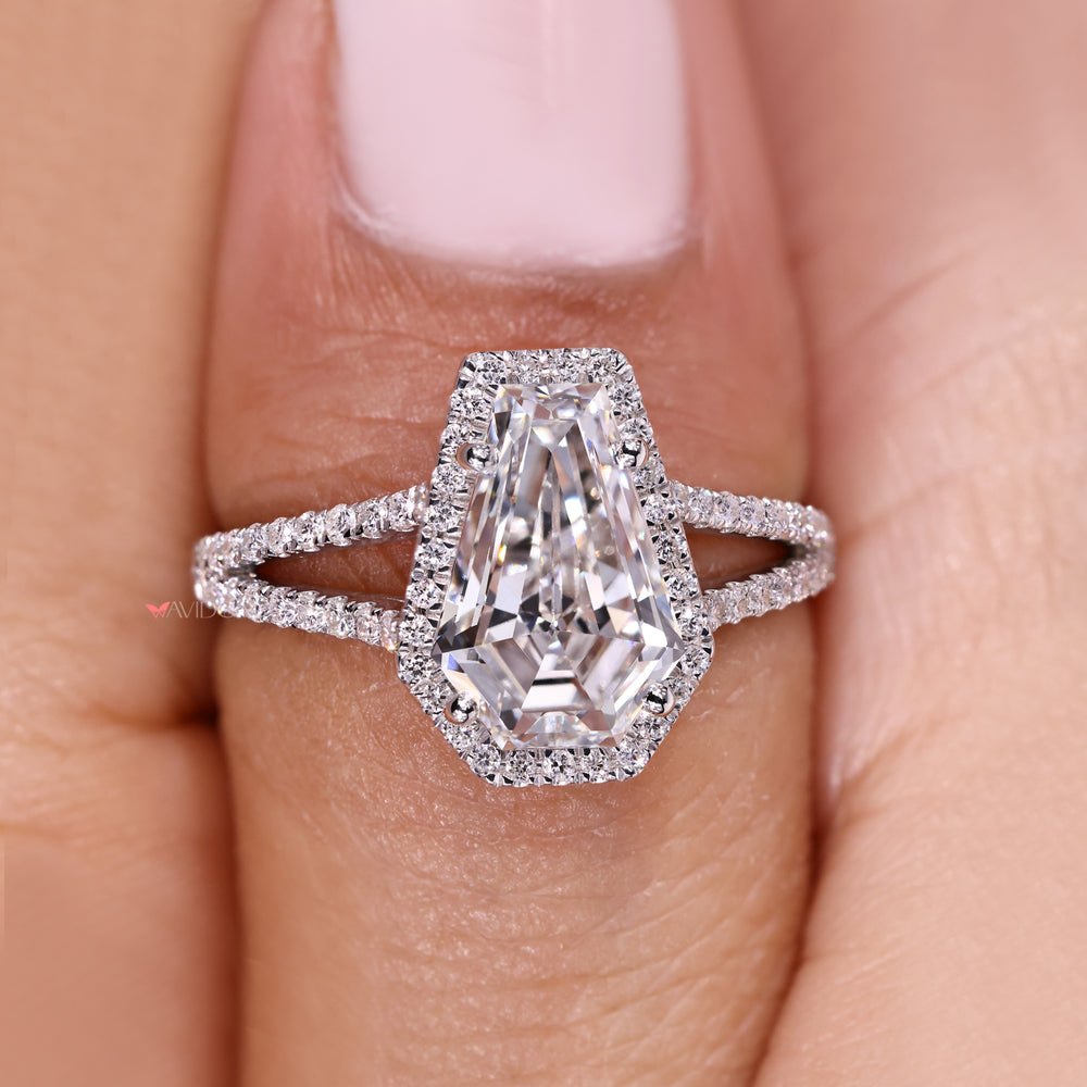 Coffin cut diamond ring with sparkling split shank.
