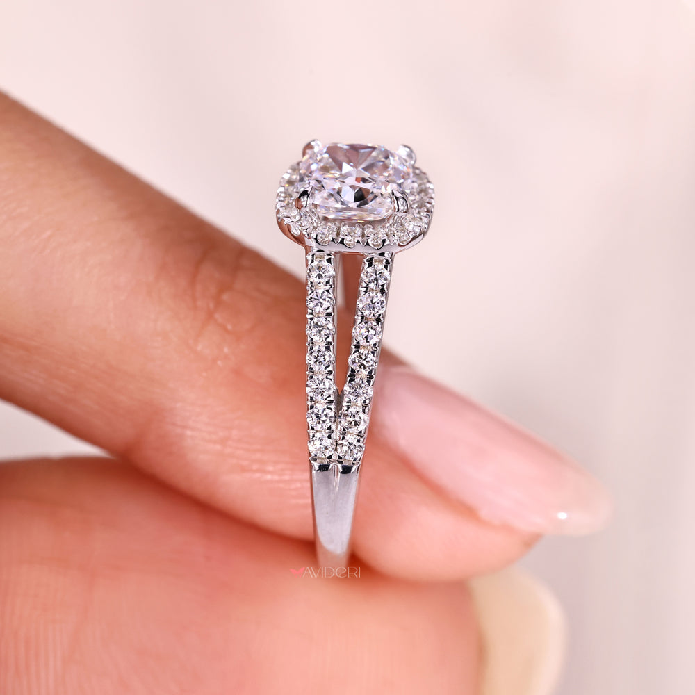 Cushion cut diamond ring with split shank pave band.
