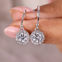 Round Diamond White Gold Drop Earrings in Halo Style