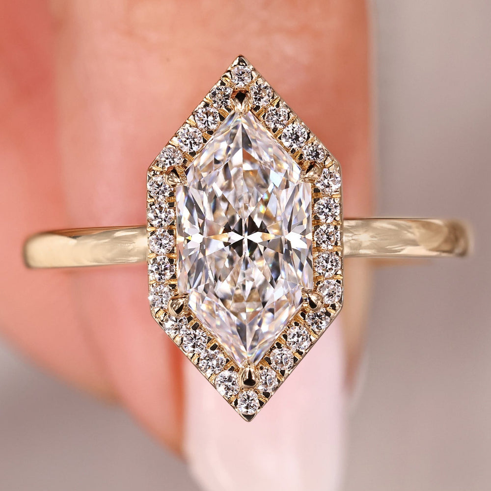 Halo diamond engagement ring combined with yellow gold engagement ring.