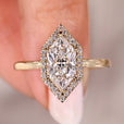 Halo diamond engagement ring combined with yellow gold engagement ring.