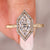 Halo diamond engagement ring combined with yellow gold engagement ring.