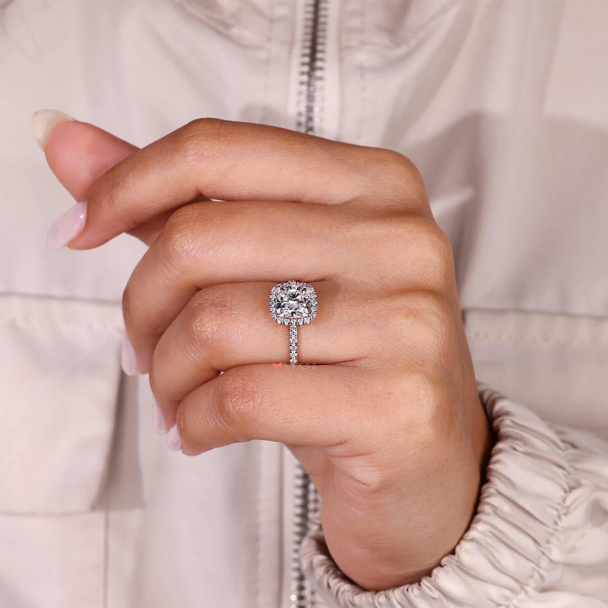 Handmade cushion cut diamond ring with pave band.
