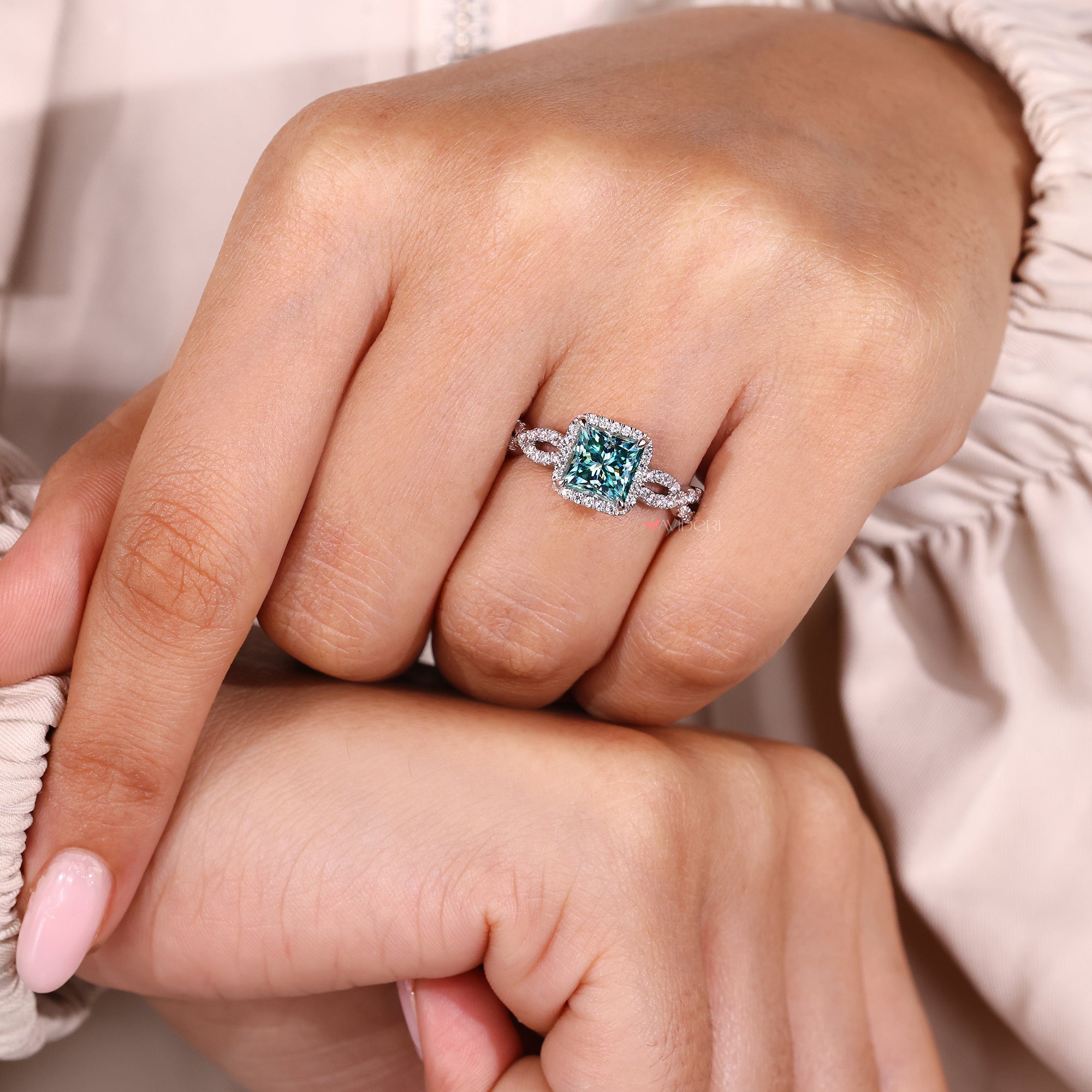 halo engagement ring for a modern and stylish look.