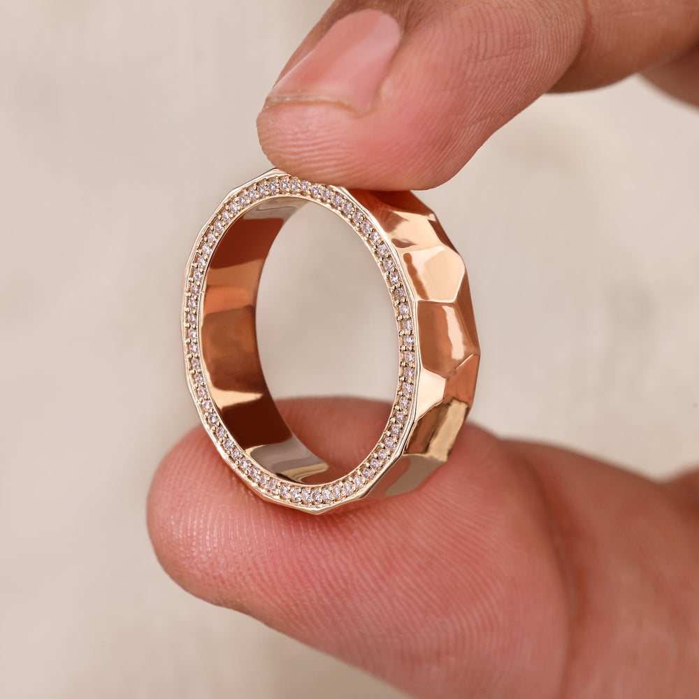 Handmade eternity band with hammered finish and diamond accents.
