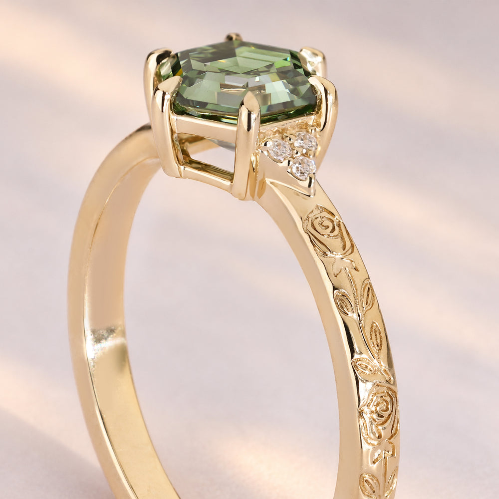 Vintage hexagon ring with rose engraving detail.
