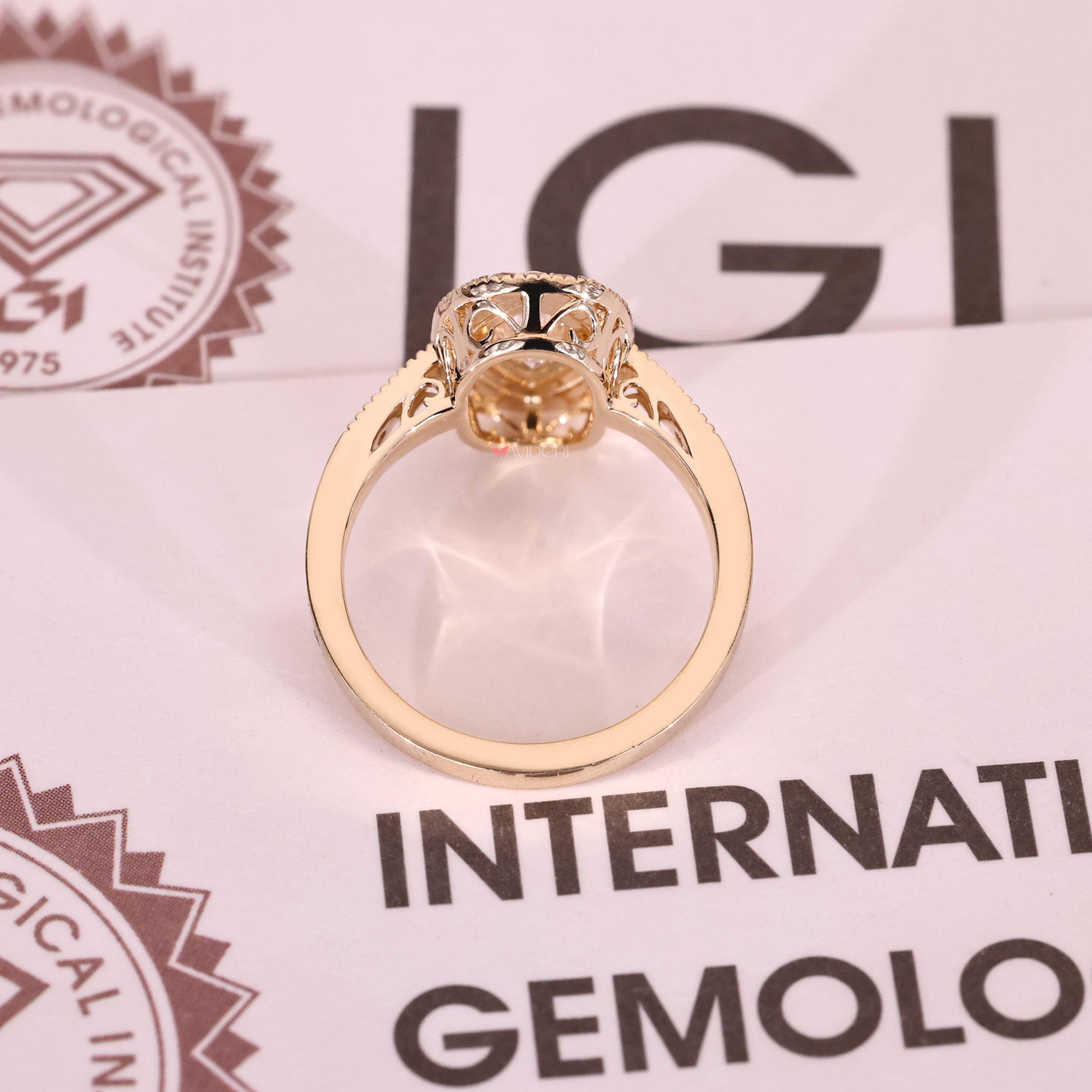 Handmade marquise diamond ring with halo design.
