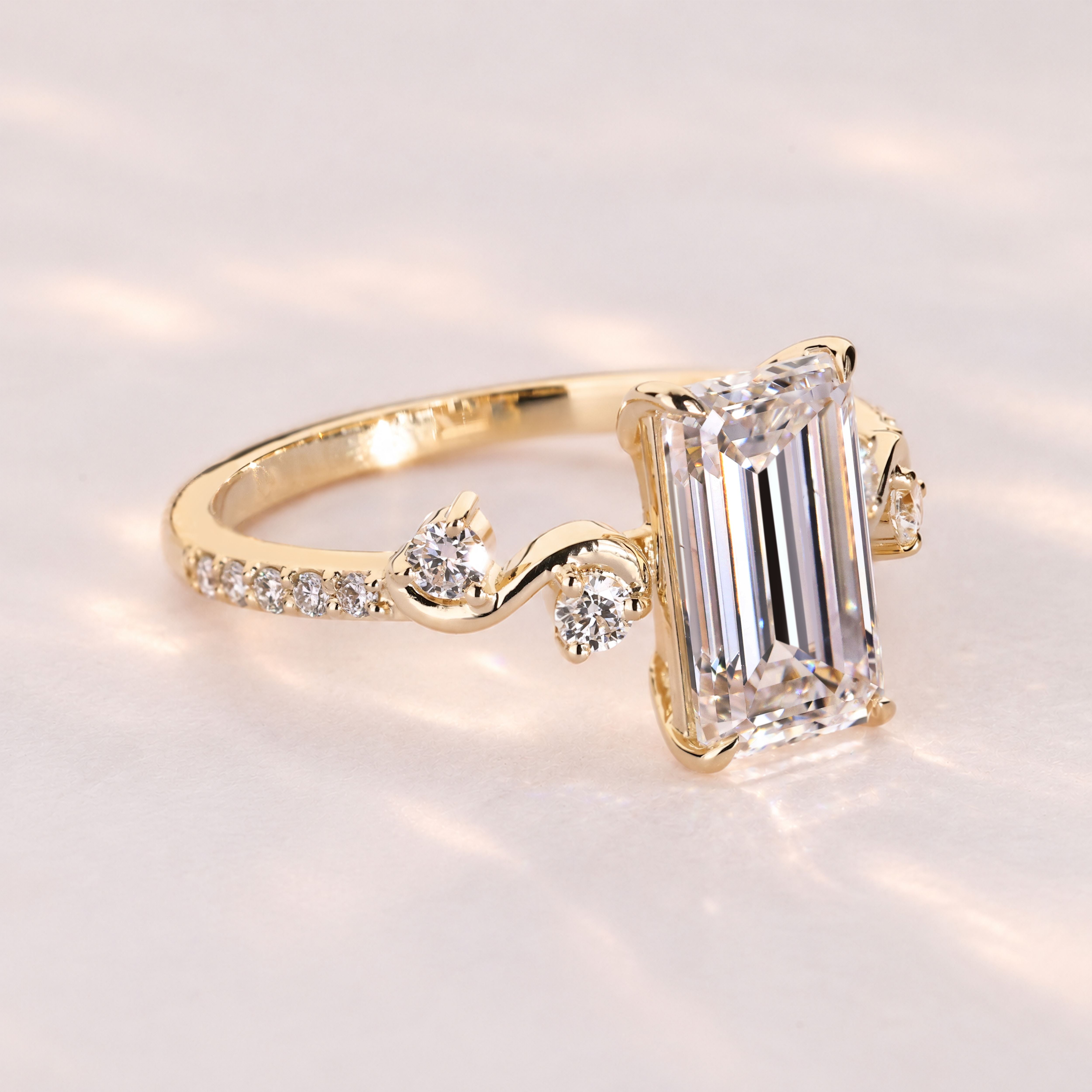 Marquise diamond ring with round diamond accents.
