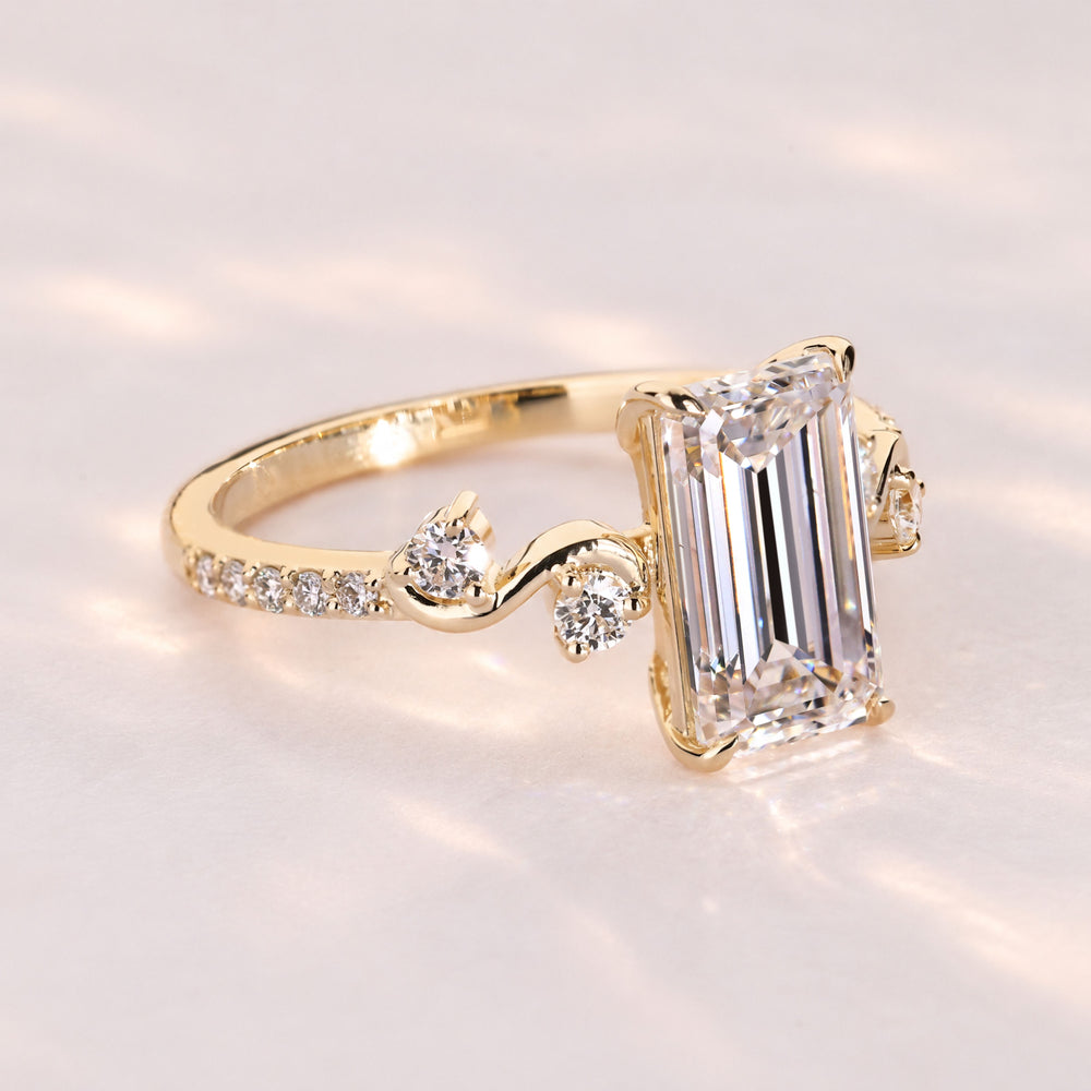 Marquise diamond ring with round diamond accents.
