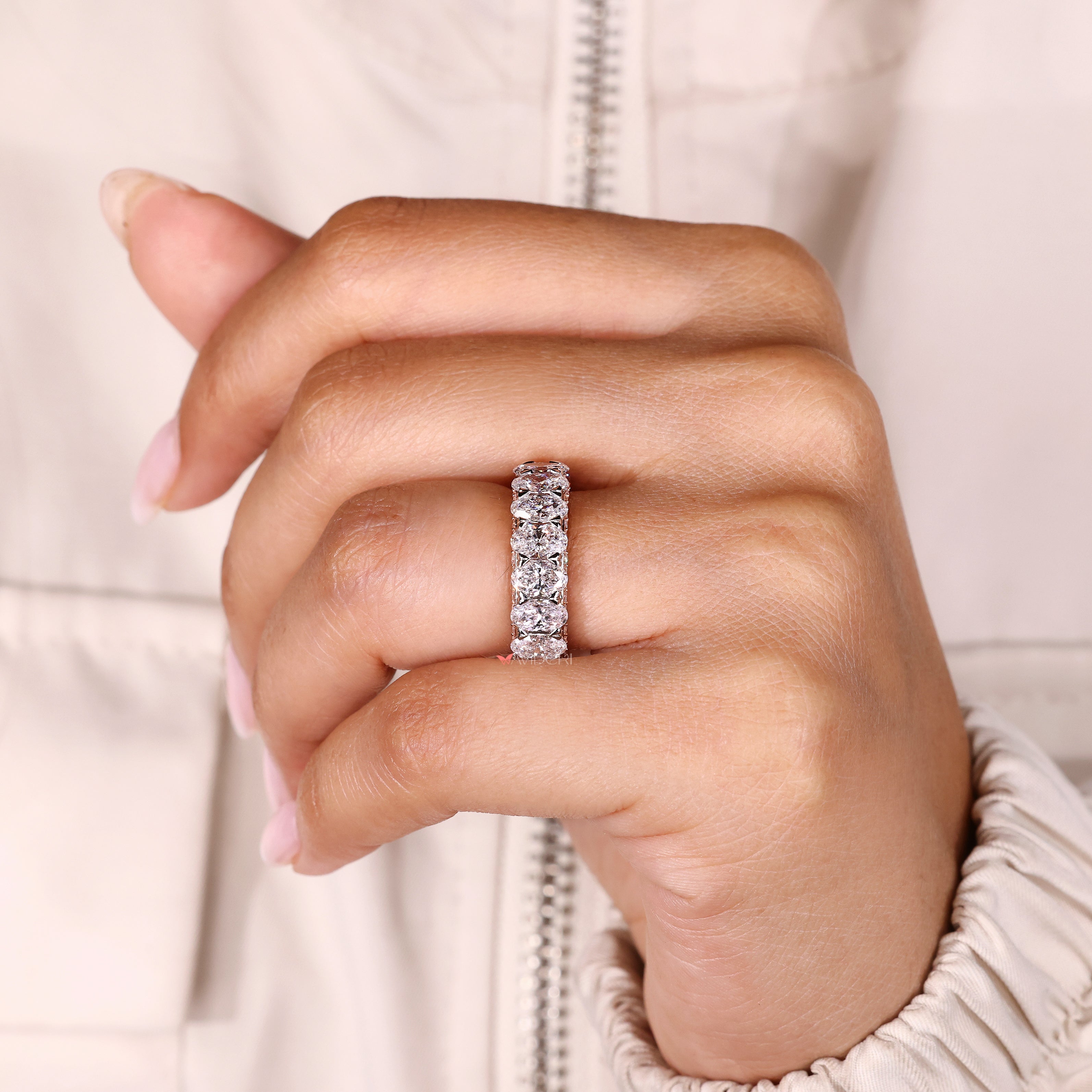 Oval diamond band two tone eternity style.
