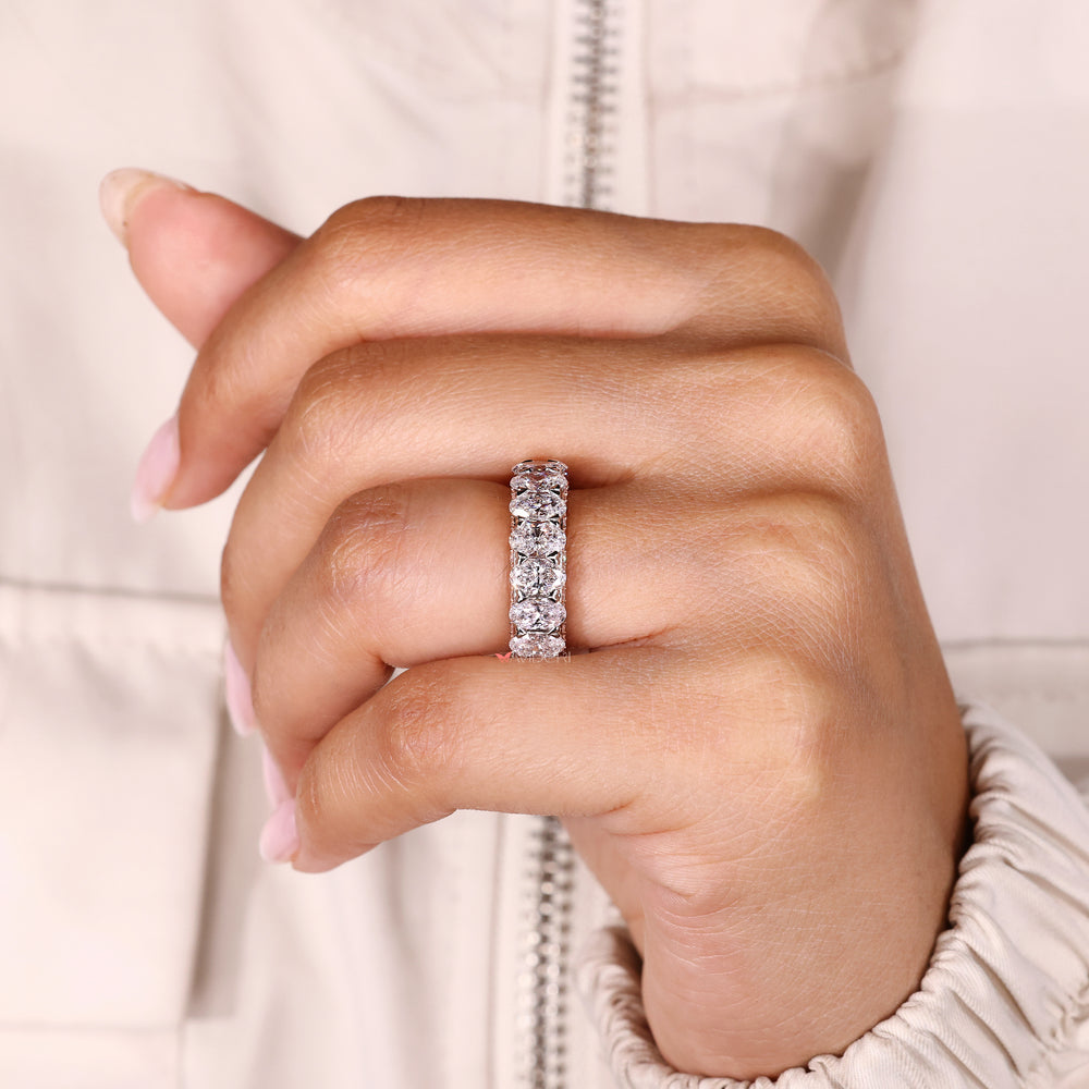 Oval diamond band two tone eternity style.

