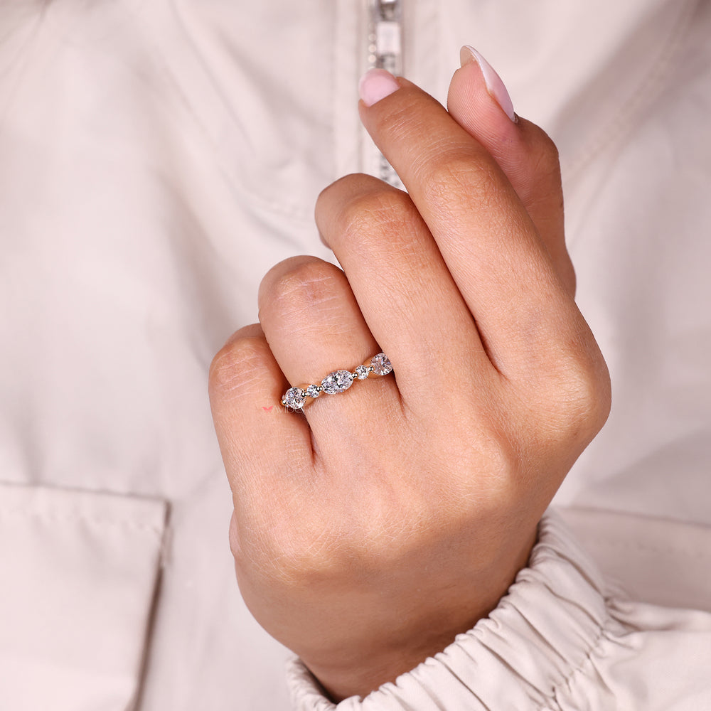 Handmade half eternity diamond band with round stones.
