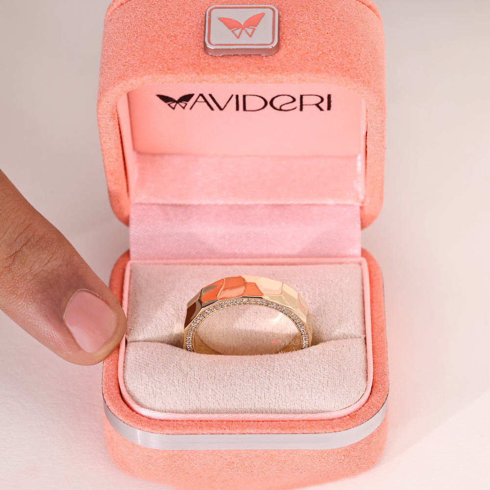 Hammered finish eternity band with round lab grown diamonds.
