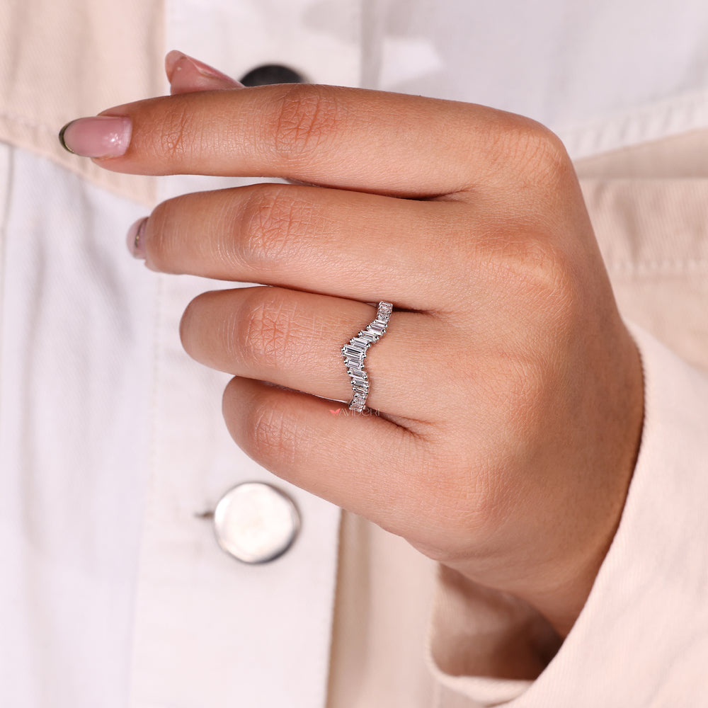 Elegant half eternity band with prong set diamonds.
