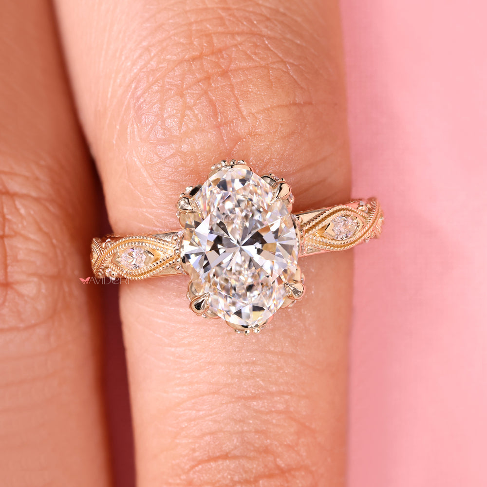 Vintage oval diamond ring with milgrain style.
