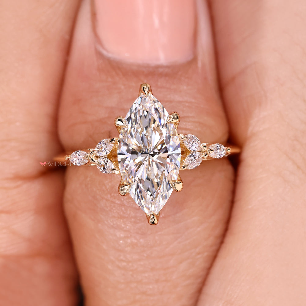 Marquise diamond ring with refined muse setting.
